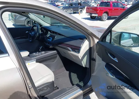 2023 Cadillac Xt4 Fwd Luxury from USA, damaged, VIN 1GYAZAR42PF109650